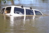 Car washed away in flooding near Fitzroy Crossing