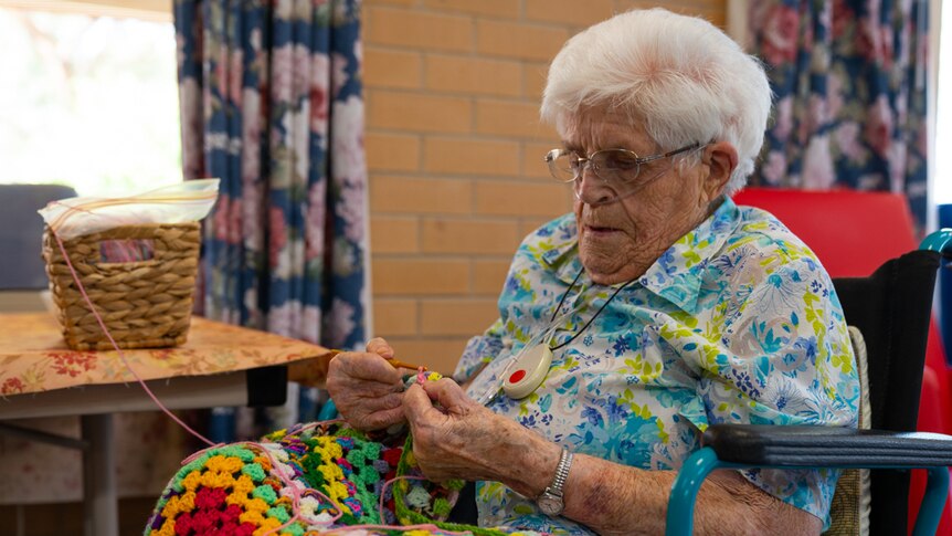 Grace Munro Centre resident Trig Cox knitting