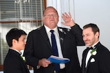 The Reverend Roger Munson performs a same-sex marriage
