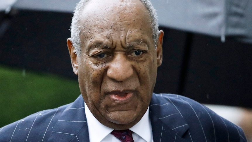 A close up photo of Bill Cosby, an African-America comedian.