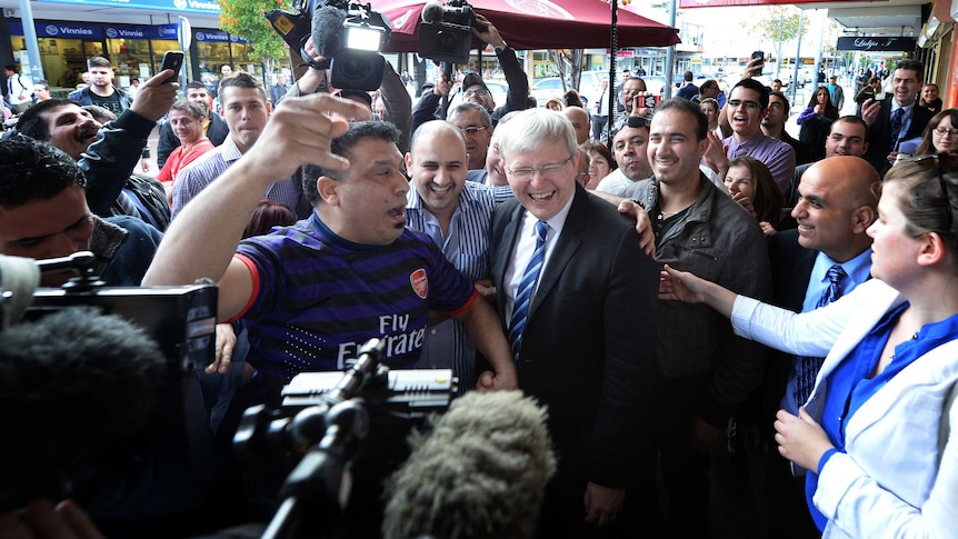 Kevin Rudd is swamped by crowds during a visit to the electorate of McMahon in Sydney.