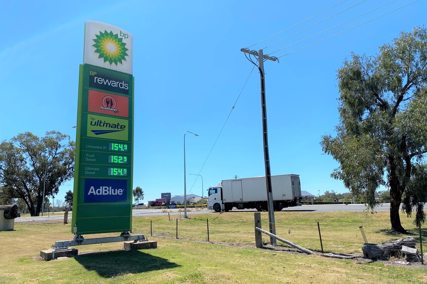 A BP petrol sign and truck.