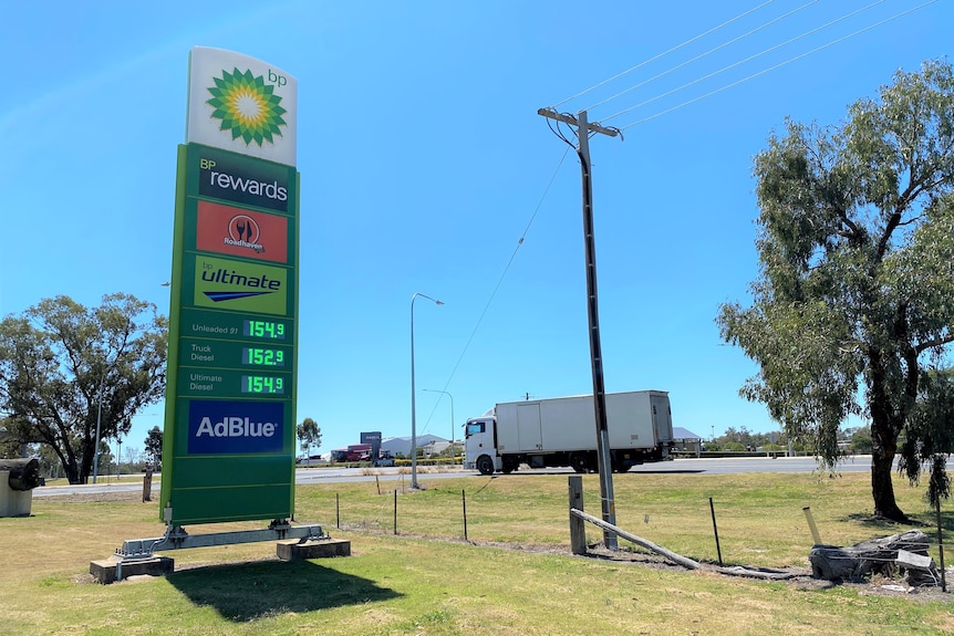 A BP petrol sign and truck.