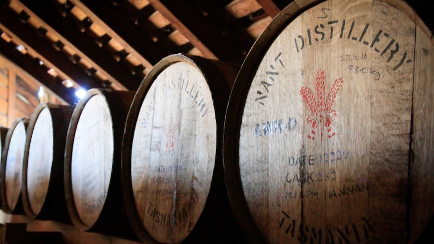 Whisky barrels in a row in the Nant distillery.