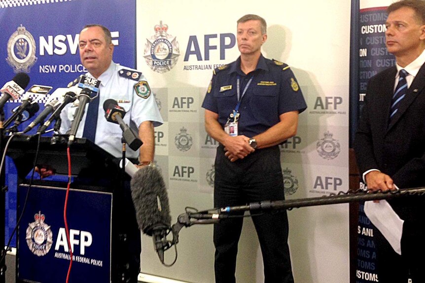 Australian Federal Police speak a press conference after seizing 230kg of liquid methylamphetamine and 250kg of cocaine, March 5, 2015.