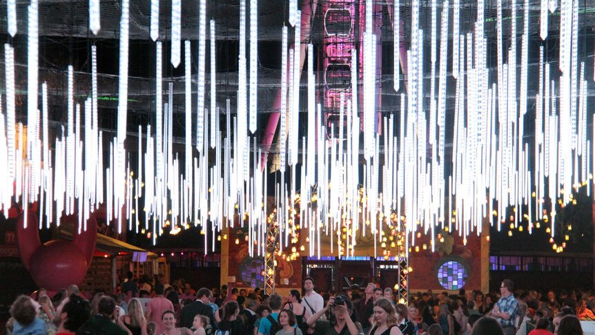 People walk through the Light Garden at South Bank during the Brisbane Festival.