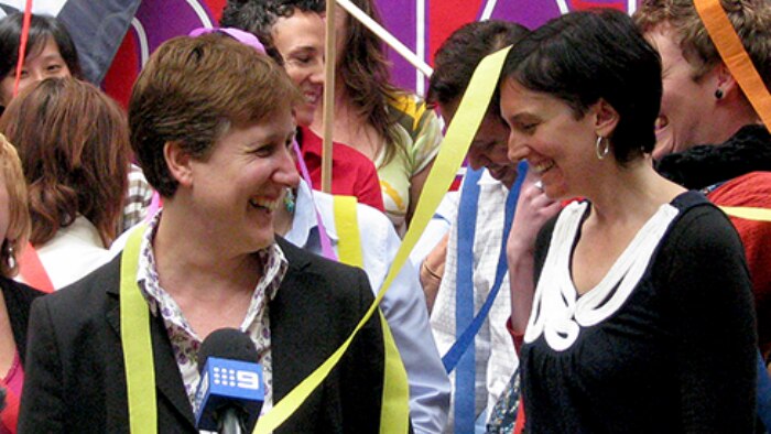Sally McManus and colleague showered in streamers in their moment of victory.