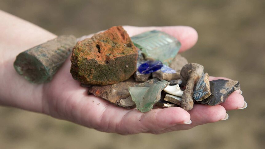 Bits of rubble including brick, glass and ceramic from the site of the 1867 Eather home in Cornwallis