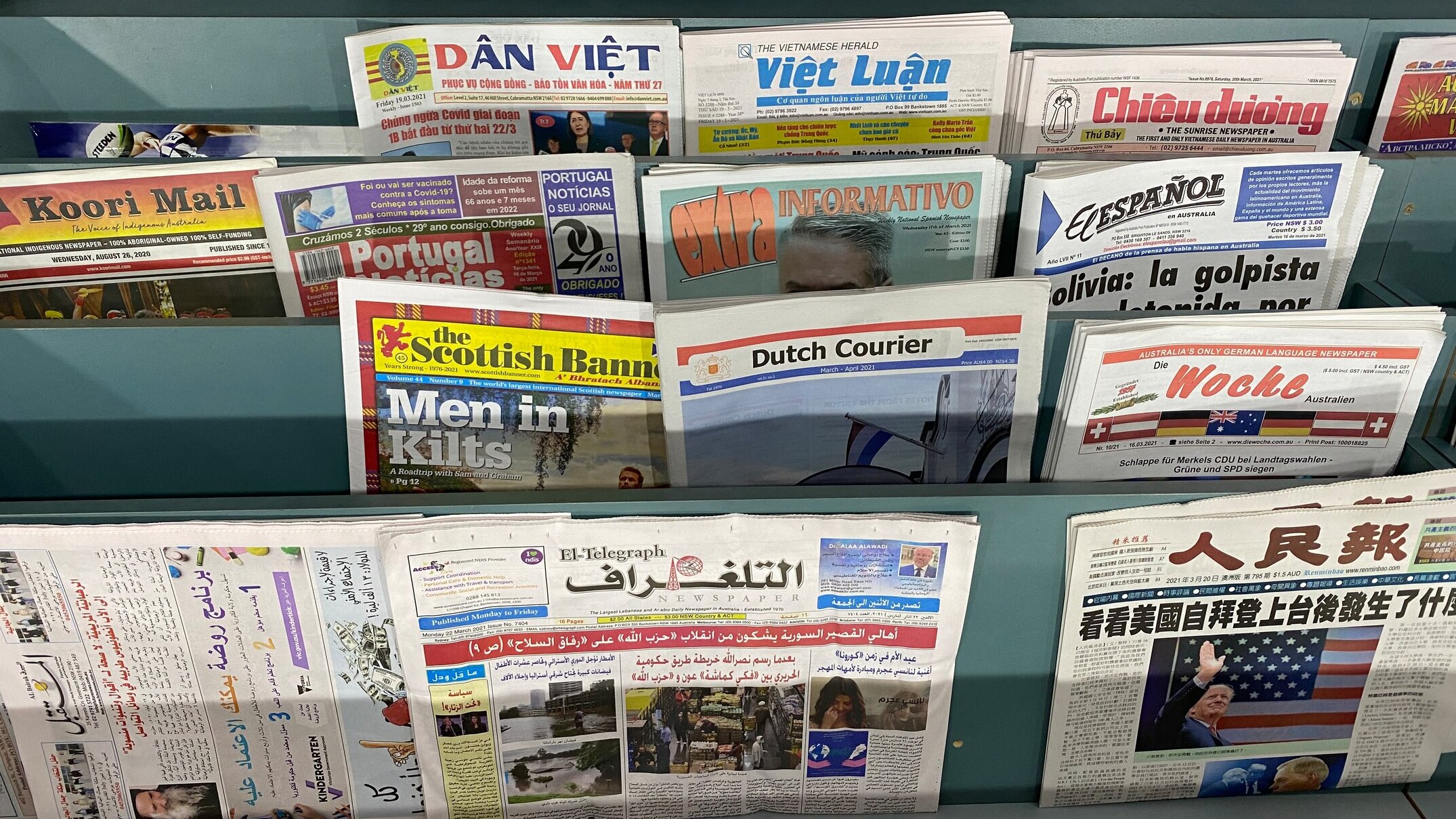 A photo of newspapers in different languages.