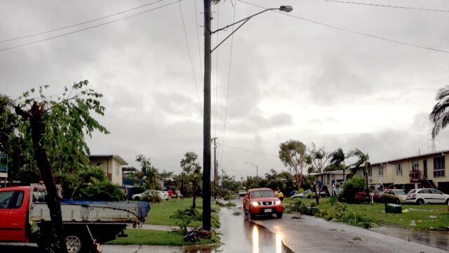 Locals check 'mini-tornado' damage in Townsville