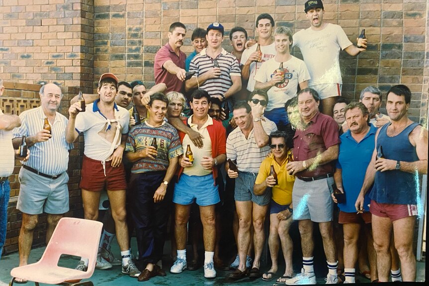 Redcliffe Dolphins' players pose with beers on a 1991 Mad Monday.
