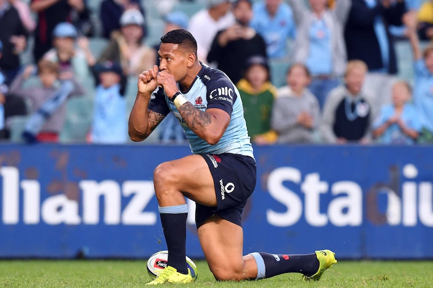 Israel Folau celebrates a try during the Waratahs' thrashing of the Rebels in Sydney.