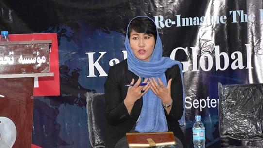 An image of Mitra giving an address in Kabul in 2018. 