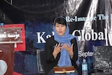 An image of Mitra giving an address in Kabul in 2018. 