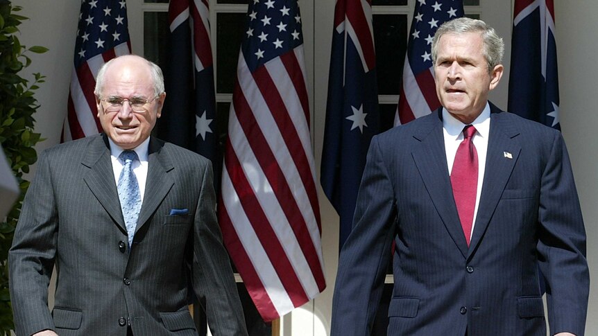 John Howard and George W Bush outside the White House in 2004