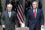 John Howard and George W Bush outside the White House in 2004