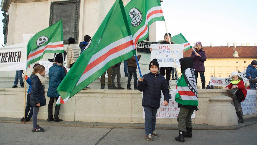 Children protest in Vienna's Heroes Square over repression in Chechnya
