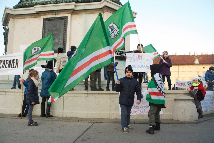 Children protest in Vienna's Heroes Square over repression in Chechnya