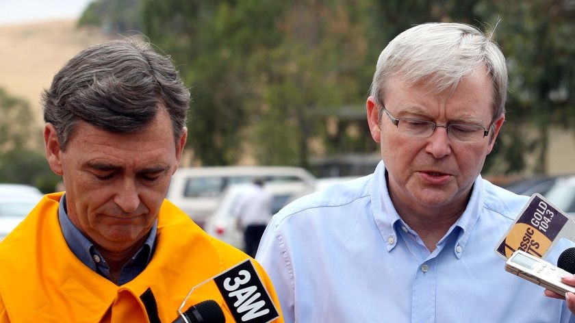 Mr Rudd, pictured with Victorian Premier John Brumby, will remain in Victoria indefinitely as the bushfires continue to burn.