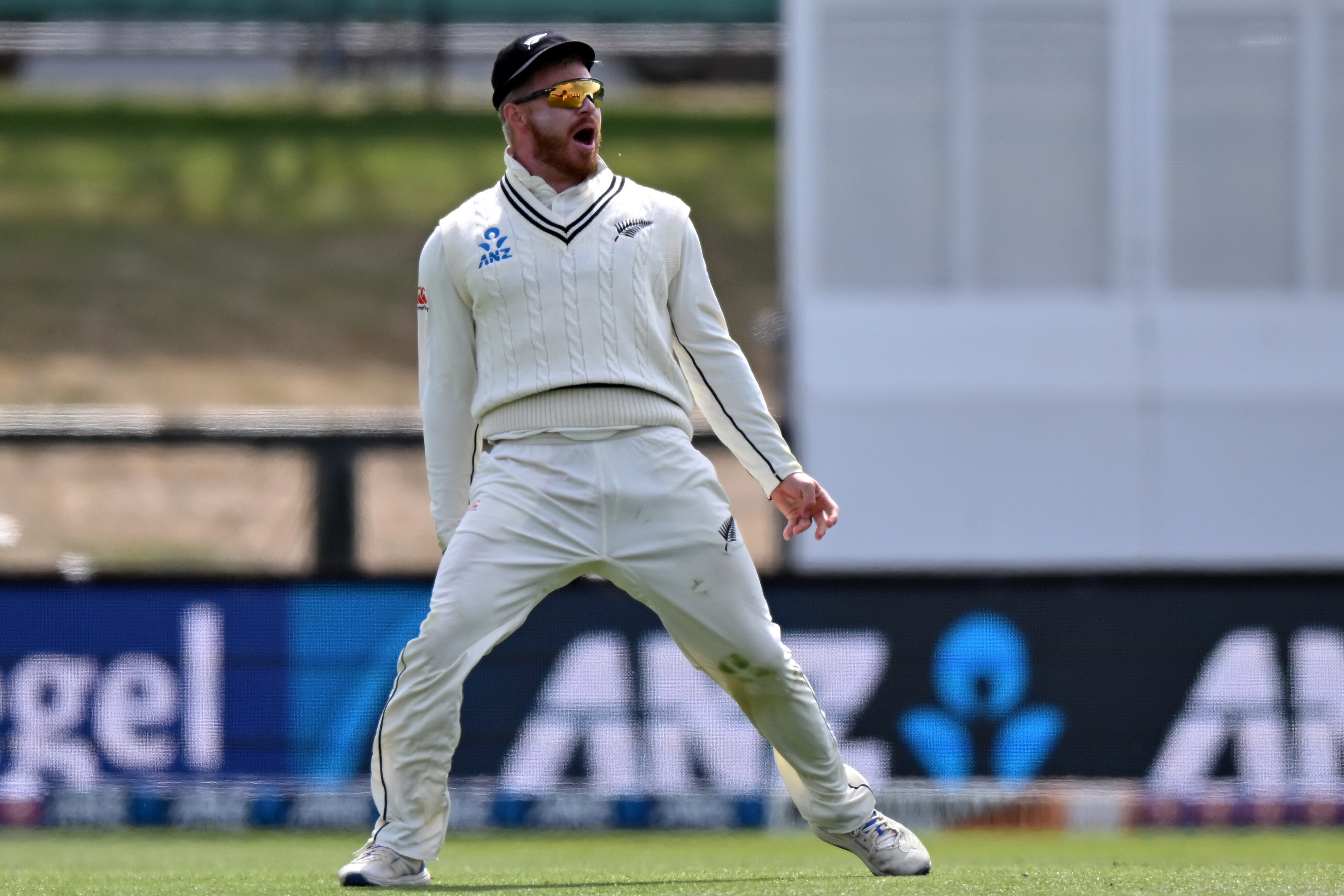 Glenn Phillips stands with his arms by his side and mouth open