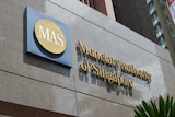 Logo of the Monetary Authority of Singapore is seen on its main building.
