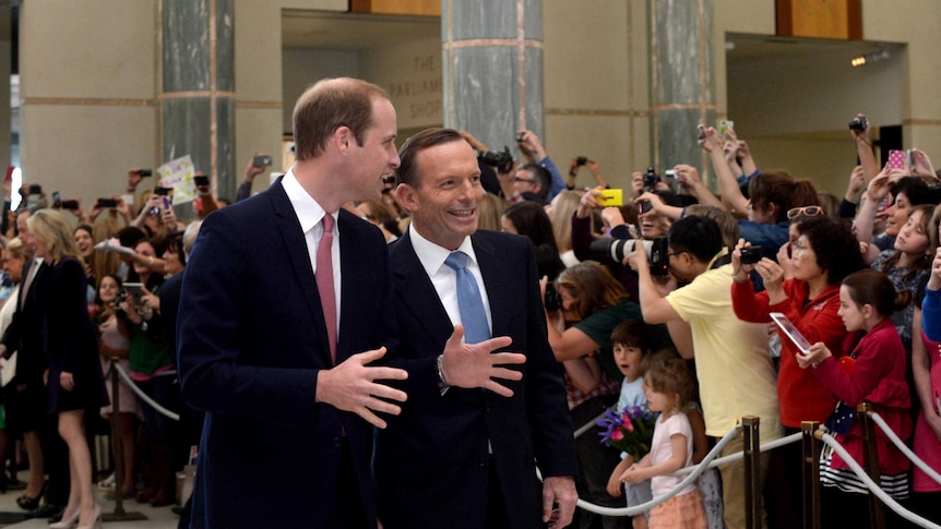 The Duke of Cambridge is escorted by Prime Minister Tony Abbott after arriving at Parliament House.