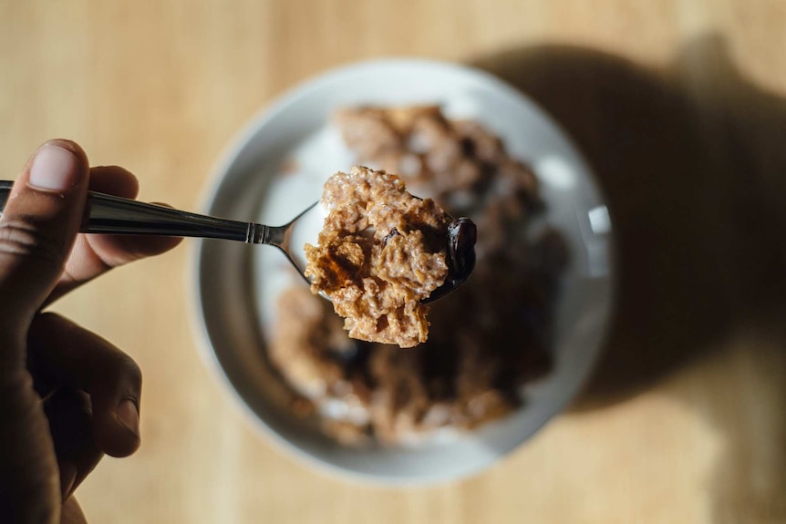 A bowl of high fibre cereal flakes in milk