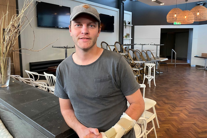 The Maid manager Charlie Bowman smiling at the camera inside the empty venue