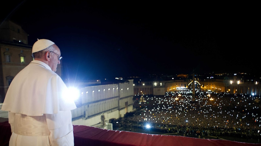 Pope looks out from balcony