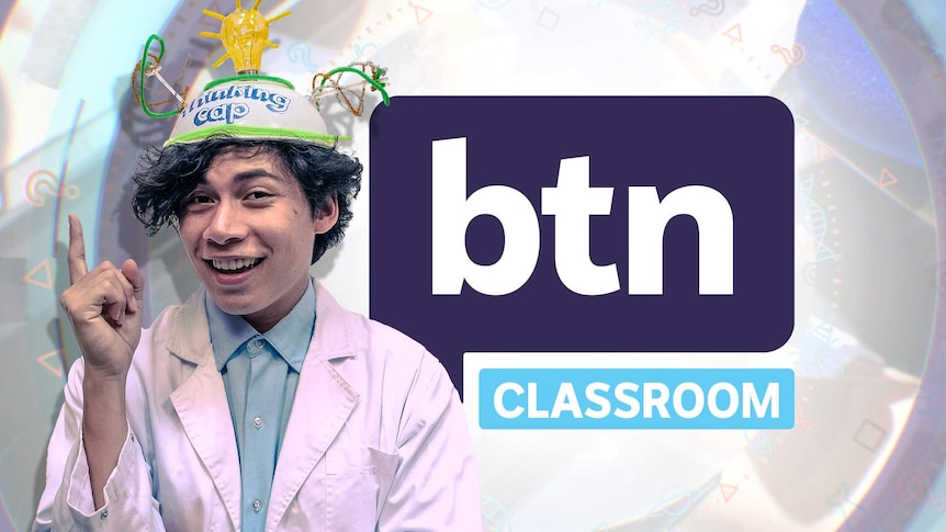 Man wearing a hat made from pipe cleaners, a light bulb and mixing bowl with 'Thinking Cap' written on it in front of BTN logo.
