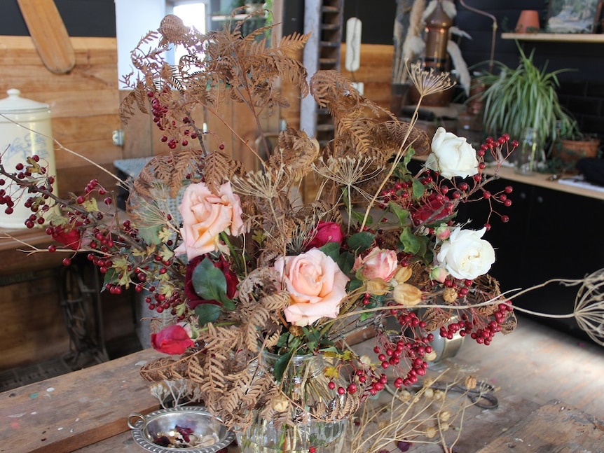 A bunch of flowers in a vase.