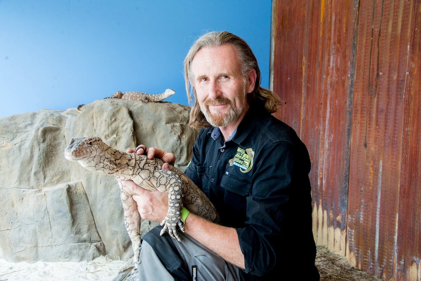 Peter Child with a perentie
