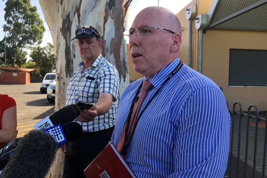 Detective chief inspector Richard Lambert speaks with the media