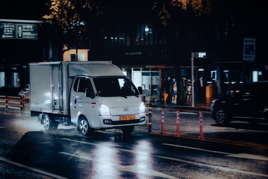 A van at night.