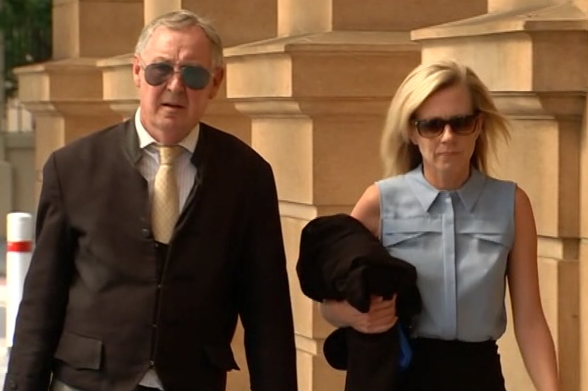 Sonia Ruth Mackay is accompanied by her lawyer as she walks to court.