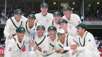 The triumphant Australians pose for photographers with the Super Test trophy