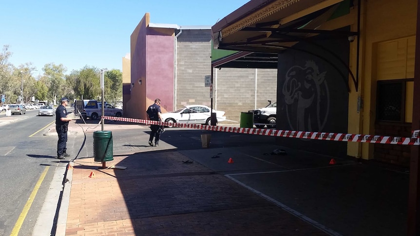 Police set up crime scene tape at the scene of a stabbing at the Todd Tavern in Alice Springs