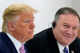 US Secretary of State Mike Pompeo looks on as US President Donald Trump attends a bilateral meeting