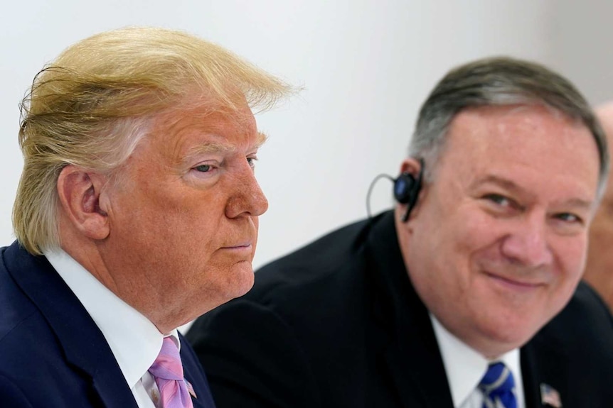 US Secretary of State Mike Pompeo looks on as US President Donald Trump attends a bilateral meeting