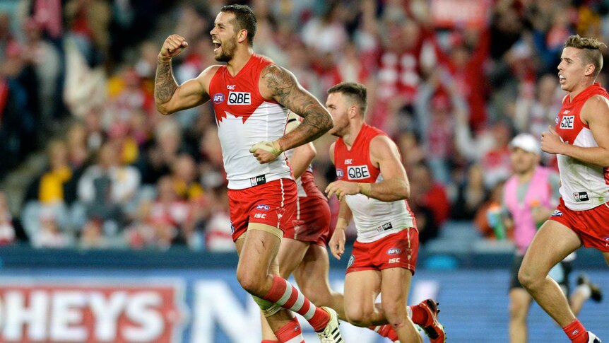 Sydney's Lance Franklin celebrates after kicking his first goal against Hawthorn.