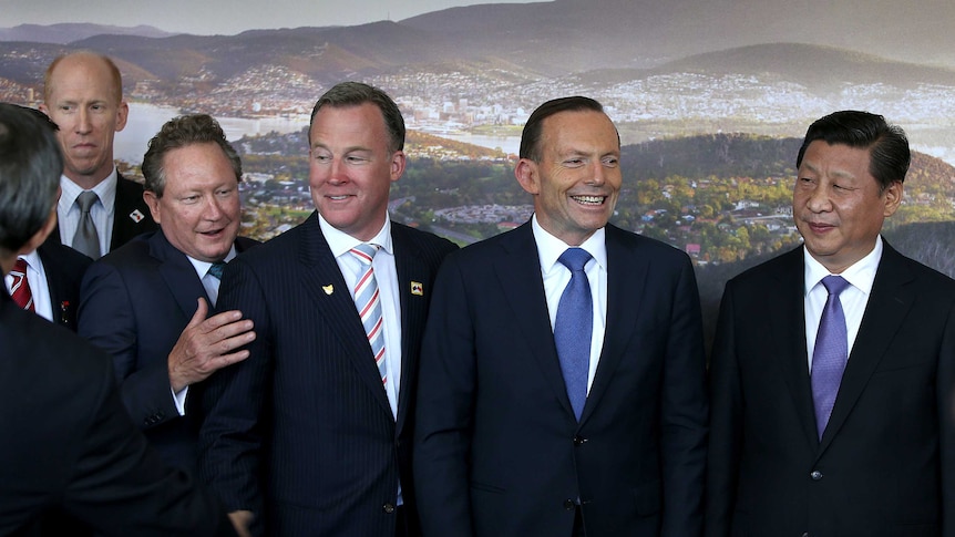 Officials pose for a photo during the Chinese President's visit to Tasmania