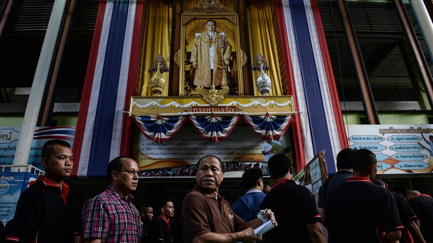 Voters queue at a polling station in Bangkok, Thailand