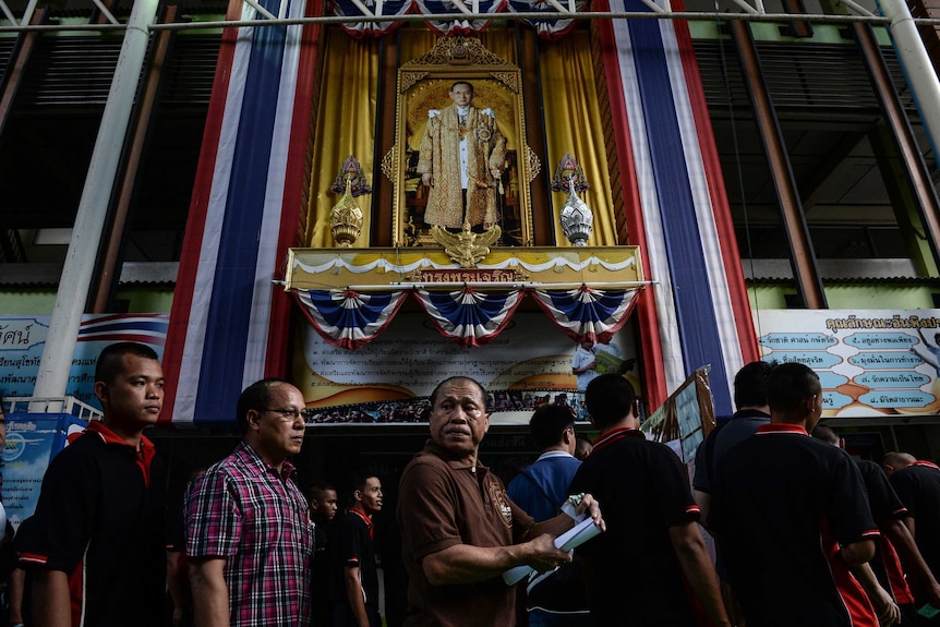 Voters queue at a polling station in Bangkok, Thailand