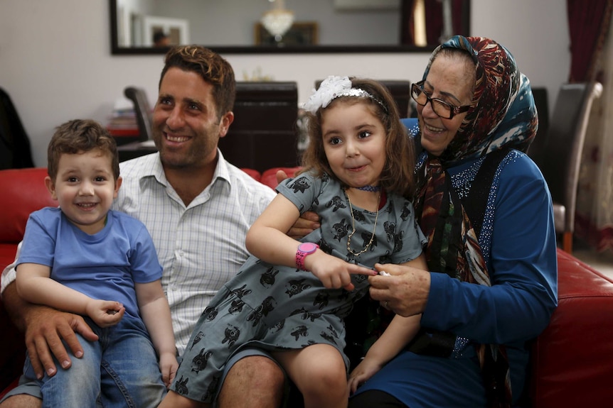 Noah and Lahela al-Amin with father Ali and grandmother in Lebanon