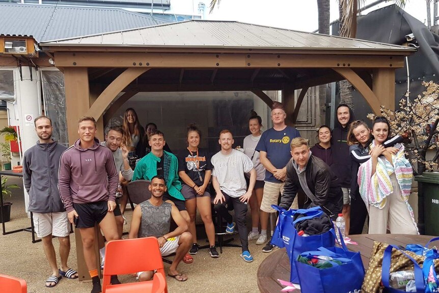 Group shot of Matt Griffiths from Rotary with 15 backpackers
