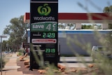 A sign advertising fuel prices at a petrol station in the Darwin CBD. 