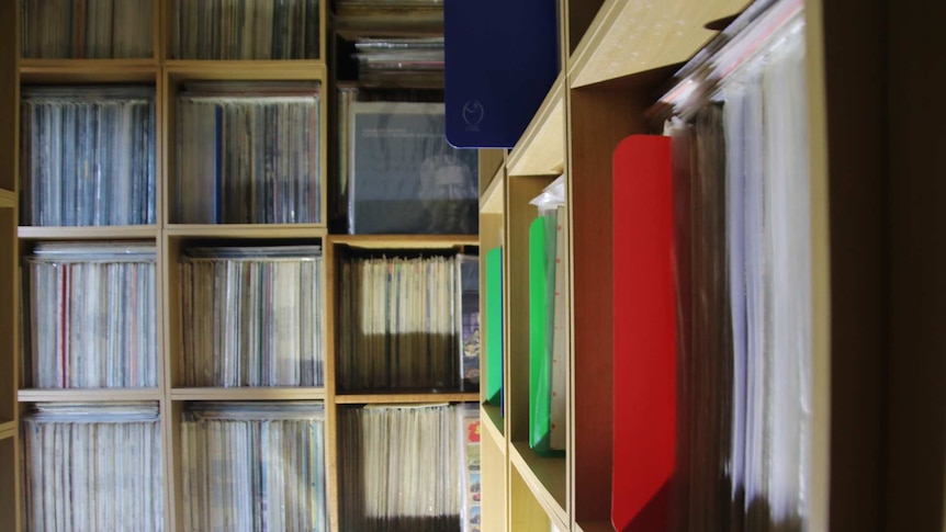 A room is filled floor to ceiling with records