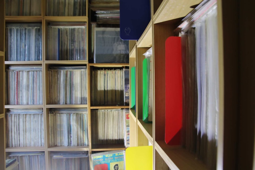 A room is filled floor to ceiling with records