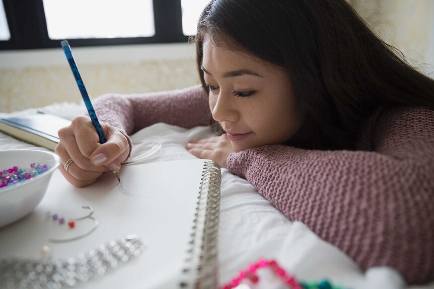 Teen doing craft