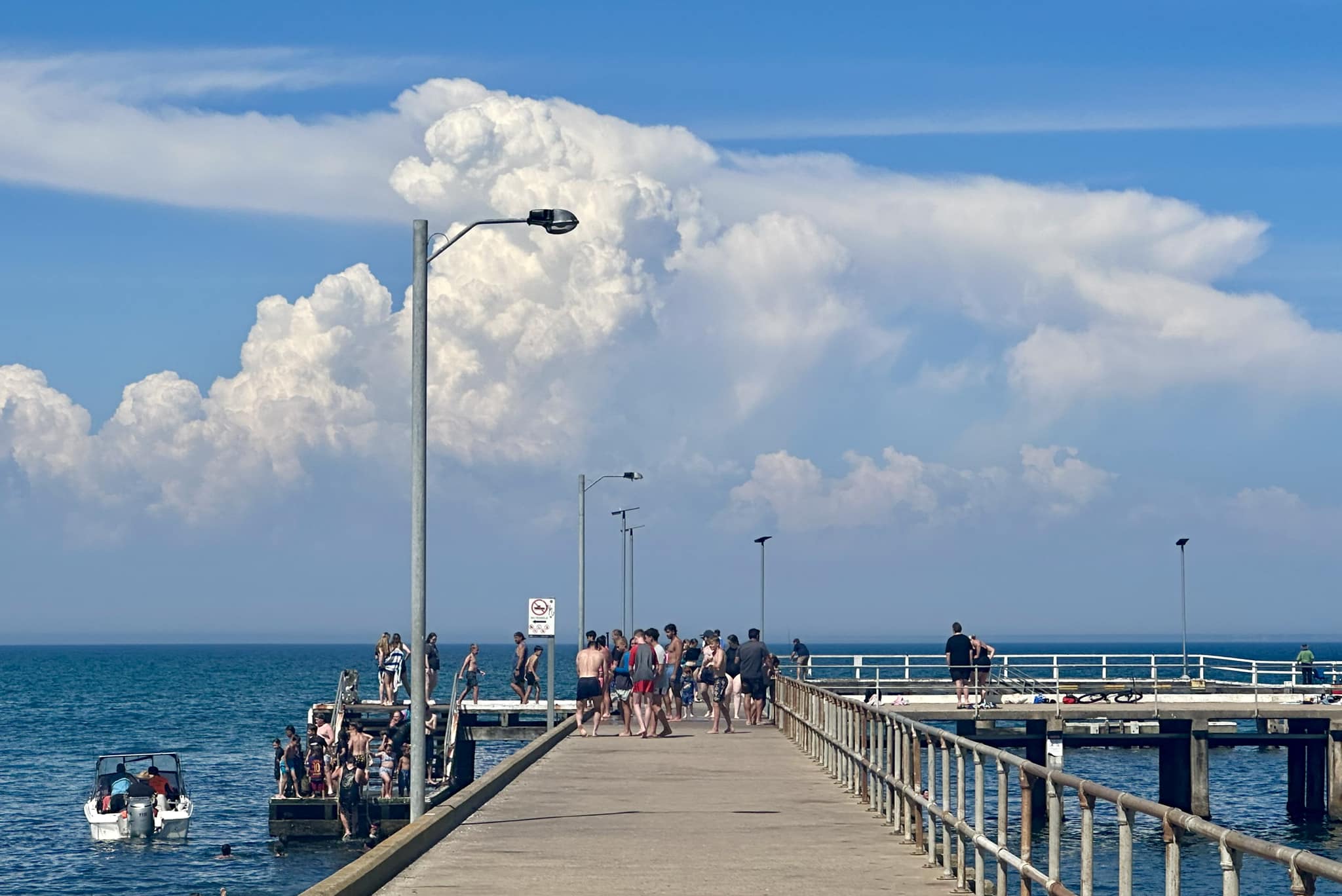 Storms build at end of jetty in St Leonards, Victoria